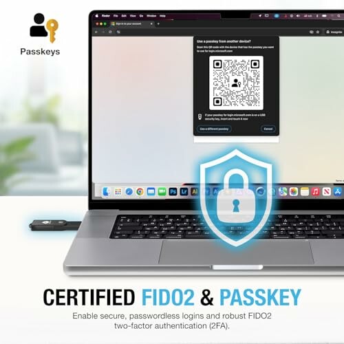 Laptop with passkey and FIDO2 authentication screen.