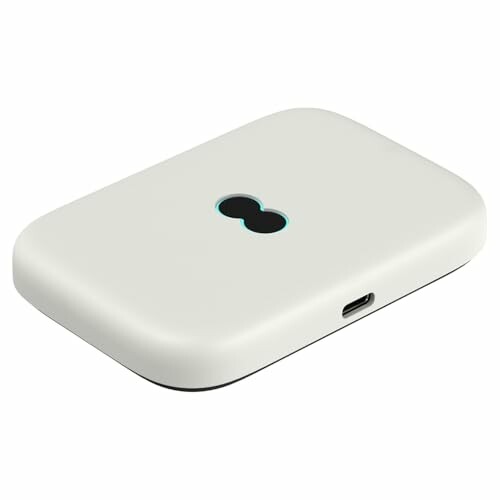 Compact portable WiFi hotspot device with USB-C port.